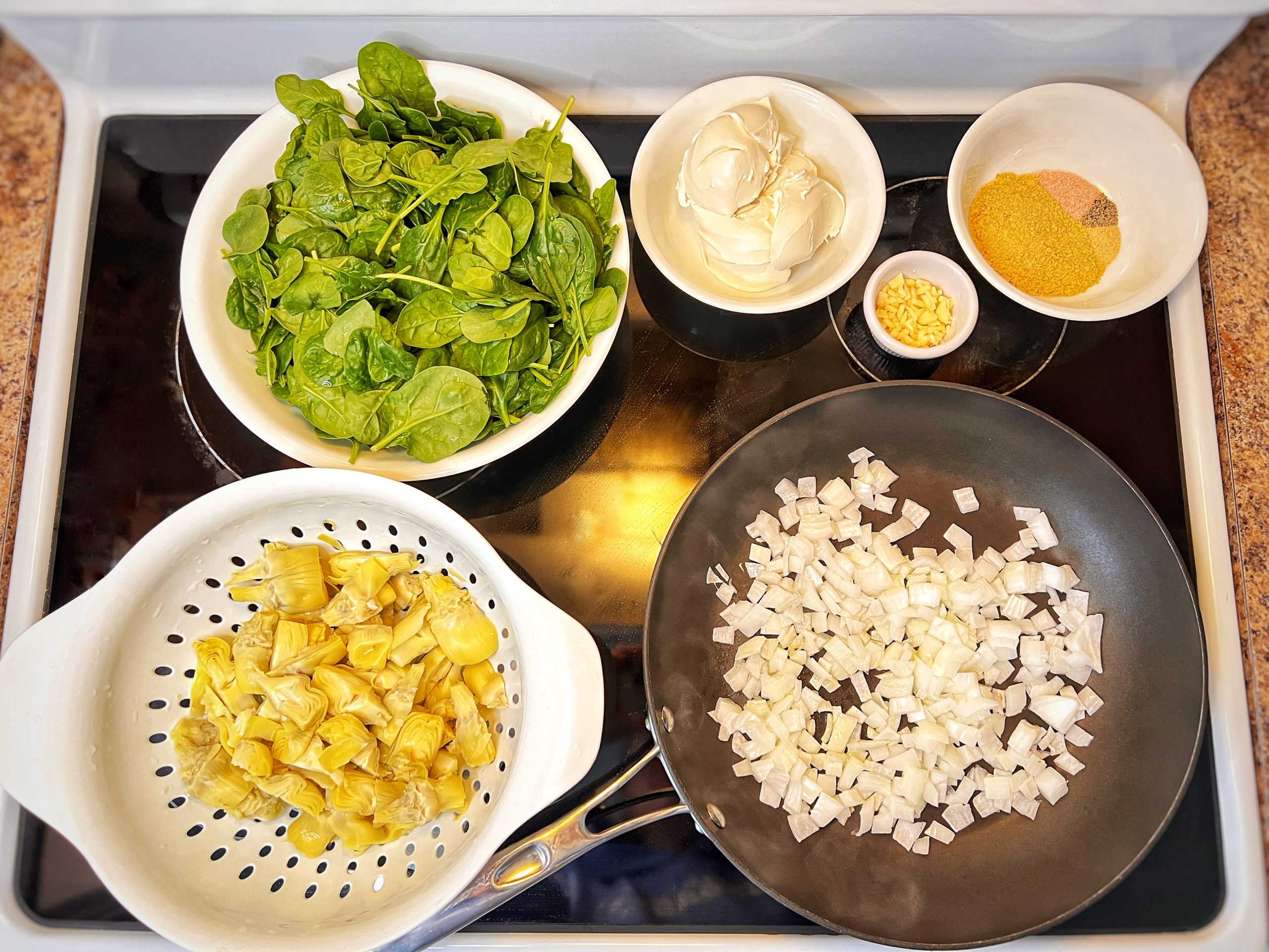 Ingredients to vegan spinach artichoke dip 