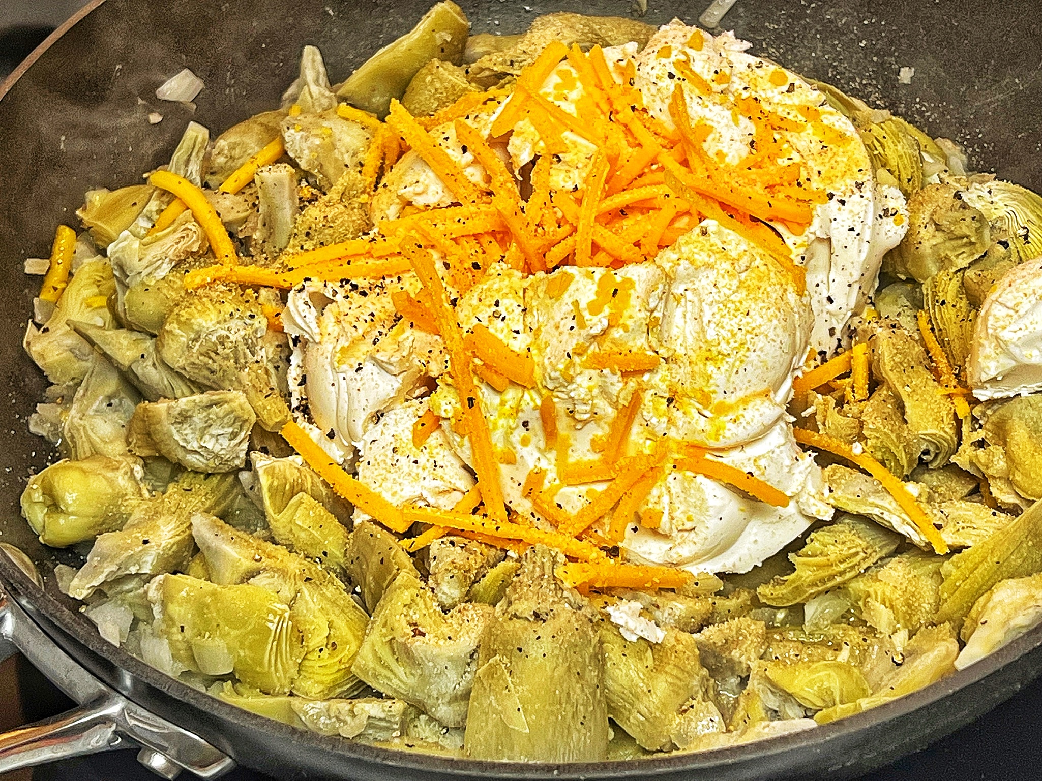 Vegan spinach artichoke dip in pan