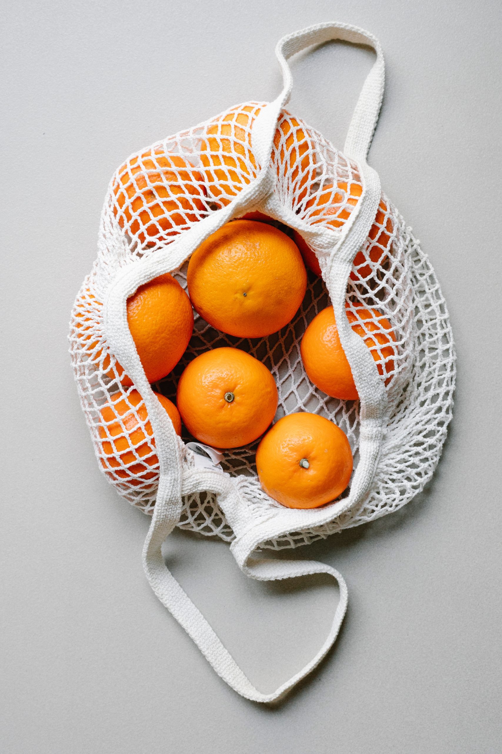 Oranges in reusable produce bag