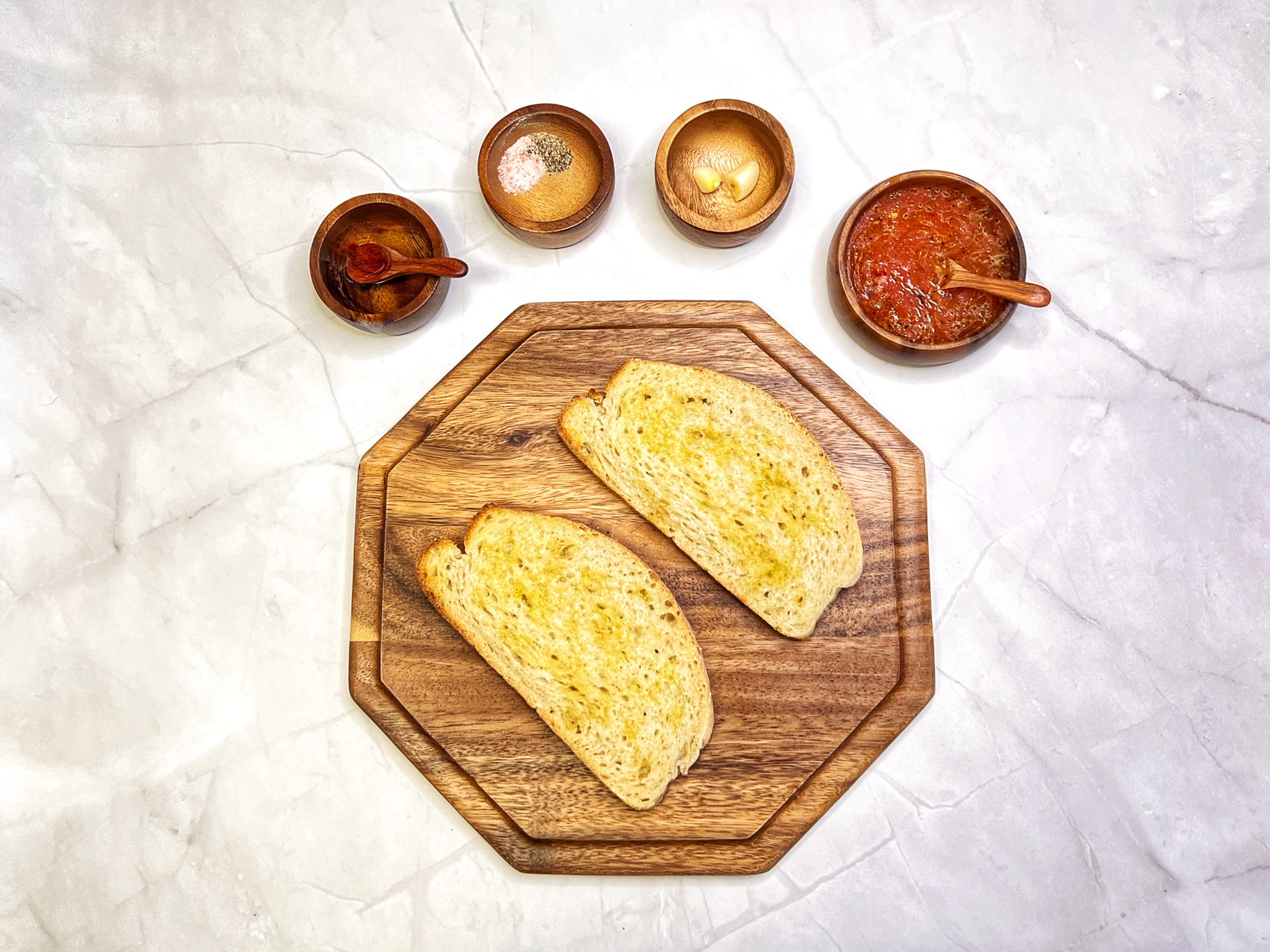 Spanish tomato toast being prepared