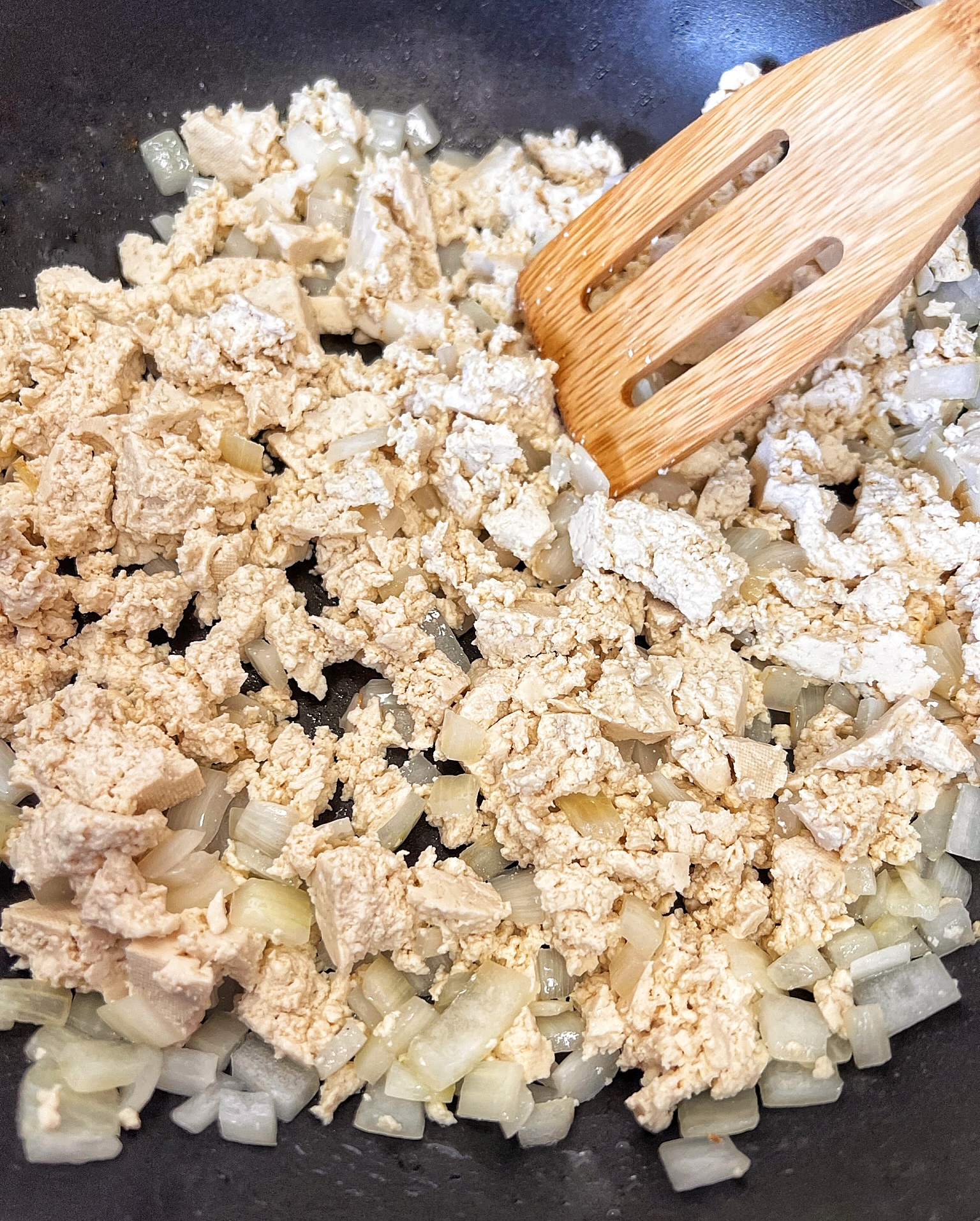 Tofu and onions cooking